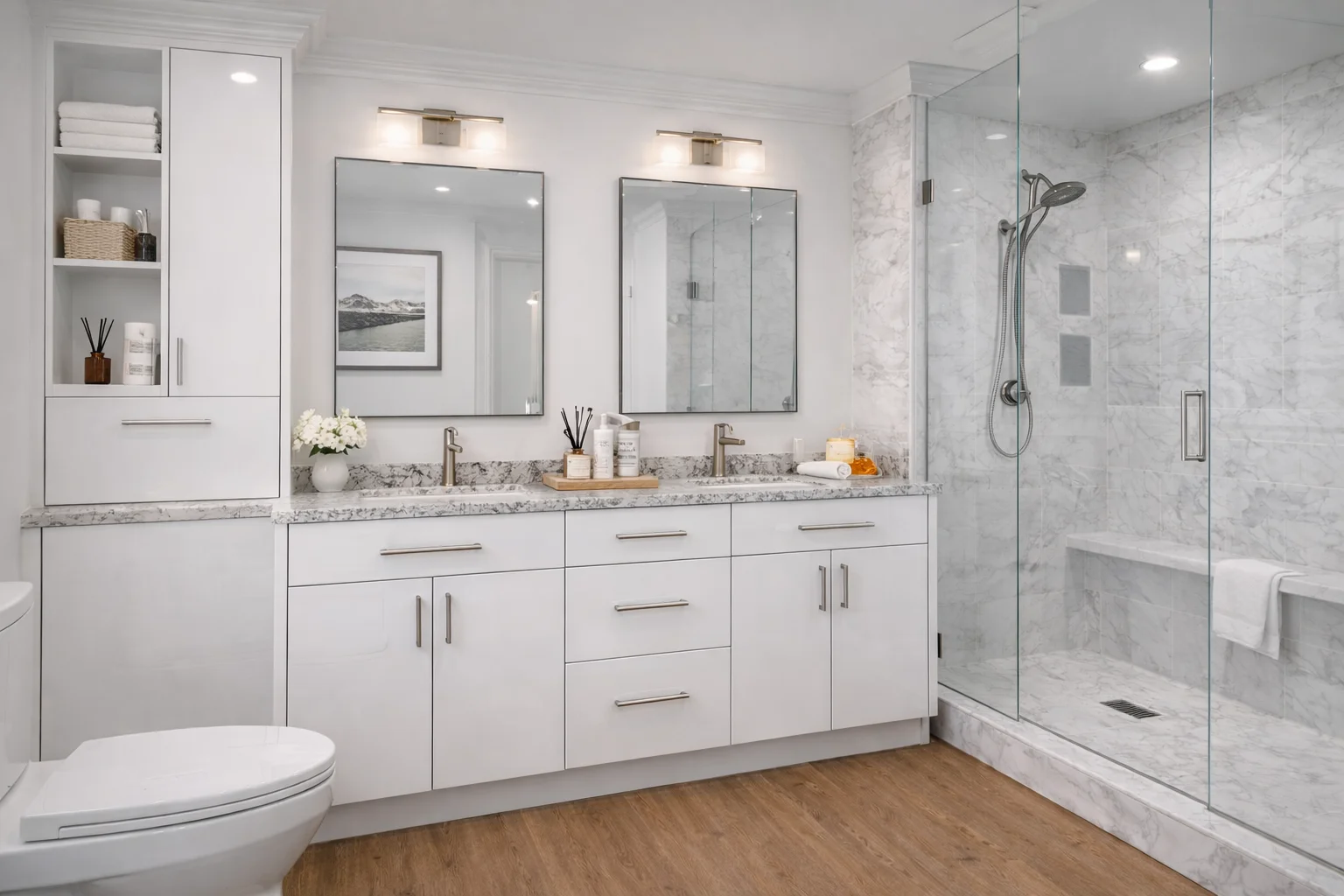 Bright modern bathroom featuring a custom glossy white double vanity with an integrated tall linen cabinet, silver hardware, dual mirrors, a white toilet, and a glass-enclosed walk-in shower with grey tile.