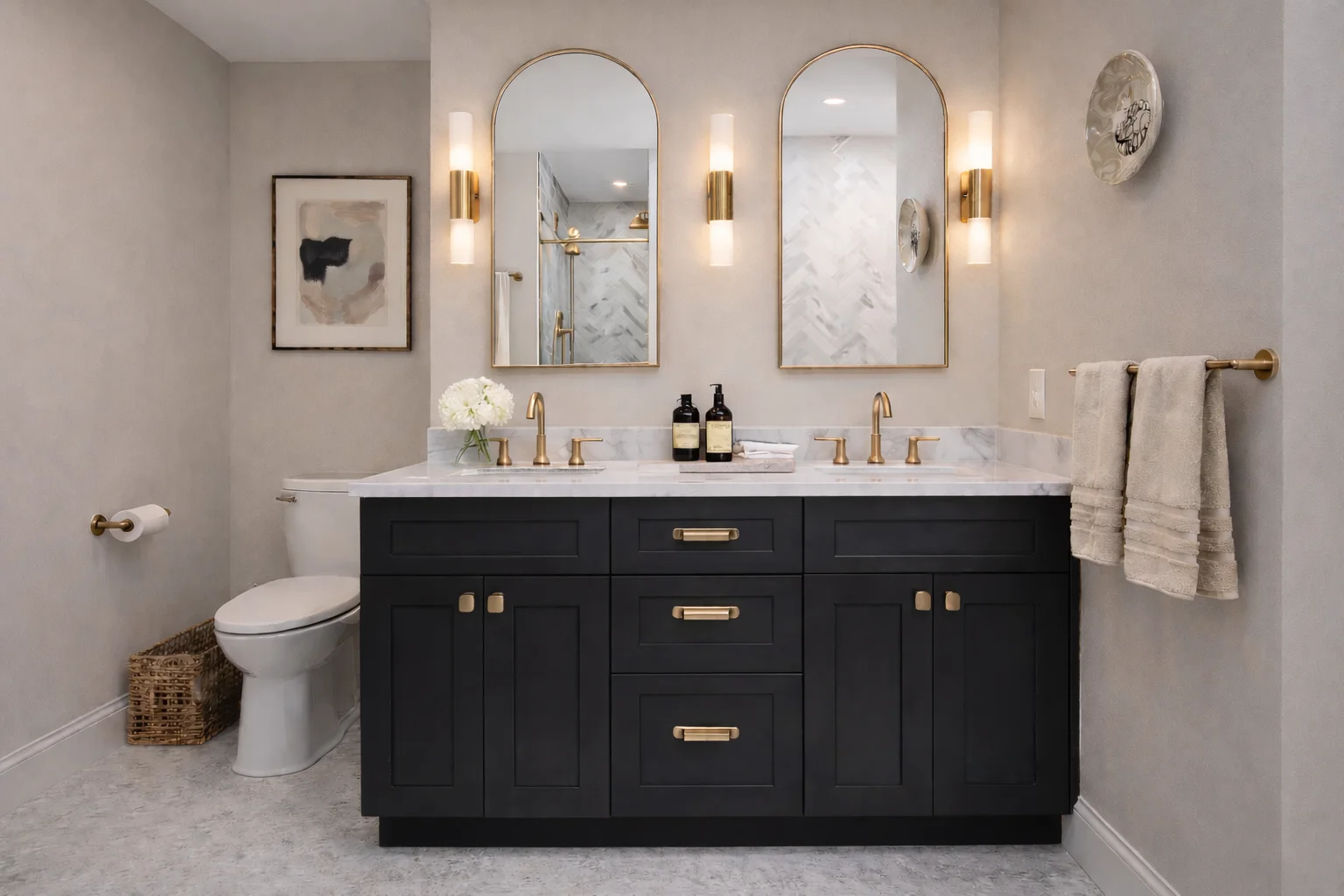 Modern bathroom featuring a custom onyx black double vanity with gold hardware, dual arched mirrors, white countertops, and a freestanding bathtub.