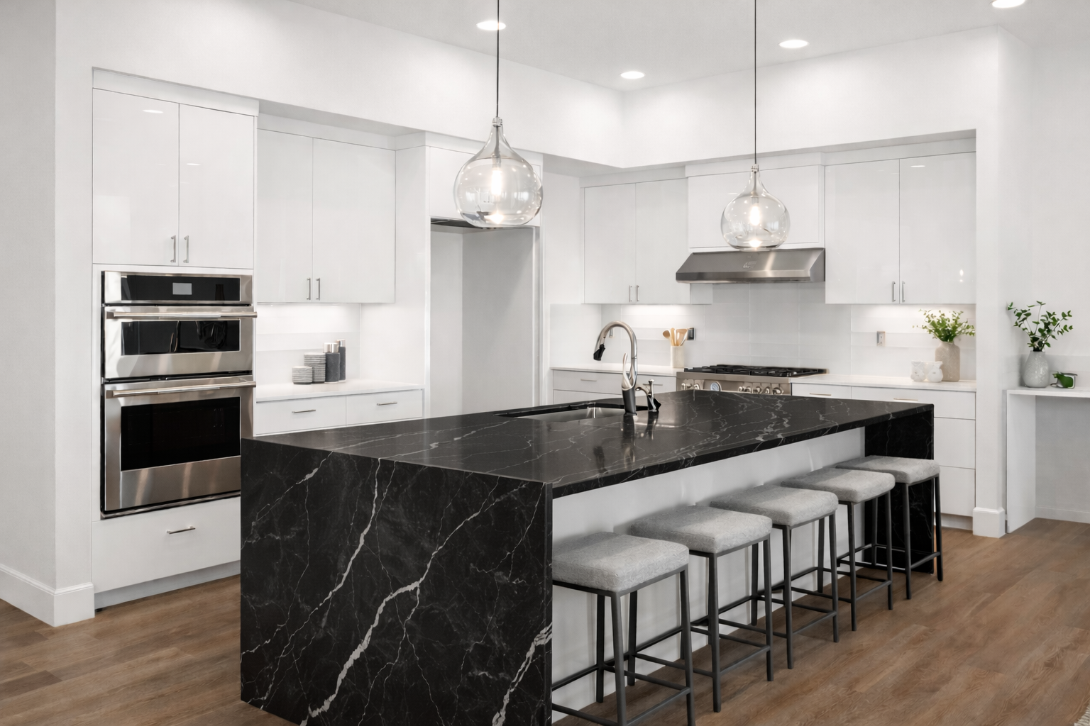 Complete high-gloss white European style kitchen featuring flat-panel frameless cabinets throughout.